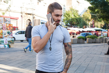 young man using mobile phone