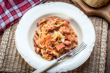 Stewed onions with sausage.