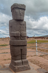Monolith at Tiwanaku, Altiplano, Titicaca region, Bolivia - One of two large anthropomorphic figures still standing on the Kalasasaya mound. Tiwanaku - ancient city near the Lake Titicaca.