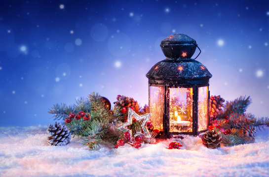 Snowy Lantern On Snow With Christmas Decoration
