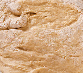 Fresh dough for bread and cakes on the towel