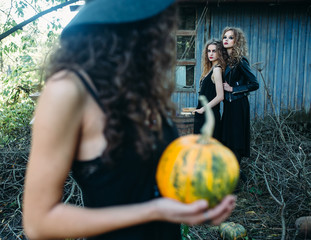 three vintage women as witches