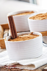 Creamy rice pudding sprinkled with cinnamon