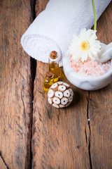 spa massage setting on wooden table 