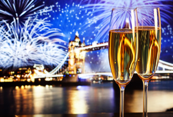 New Year celebration in the city - champagne glasses and Tower b