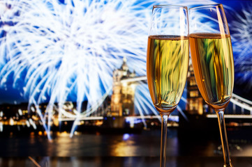 New Year celebration in the city - champagne glasses and Tower b