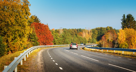 cars moving on a highway road