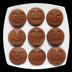 Happy Food. Smiling chocolate Pancakes. Concept of Funny Breakfa