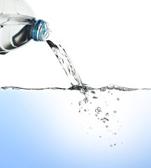 Naklejka na ściany i meble Water pour from water bottle, with clipping path
