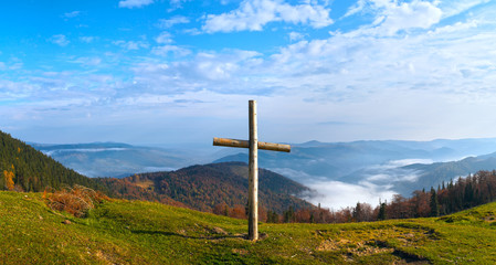 Fototapeta na wymiar Cross on mountain