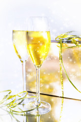 Two glasses of wine and a box on white background