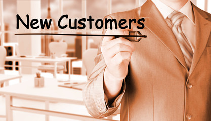 businessman writing new customers