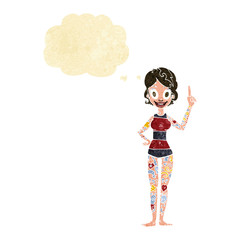 cartoon woman covered in tattoos with thought bubble