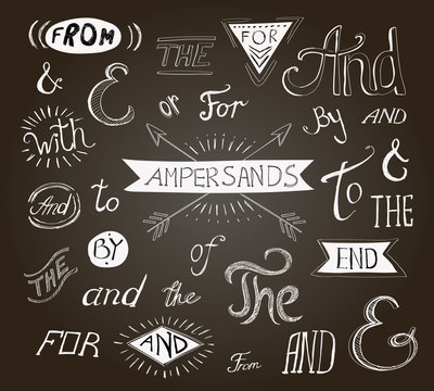 Vintage hand lettered ampersands and catchwords for Logo web designs on a chalkboard