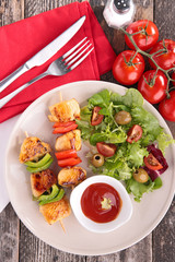 grilled meat and salad