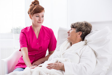 Fototapeta premium Nurse and geriatric ward patient