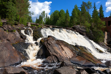 Fototapeta na wymiar Russia, Karelia. An old dam at the road Sortavala-Vyartselya