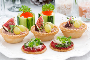 Set of festive Christmas mini appetizers, closeup