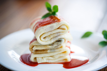 sweet pancakes with strawberry jam