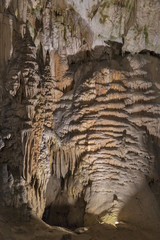 Cave inside with stalactites and stalagmites