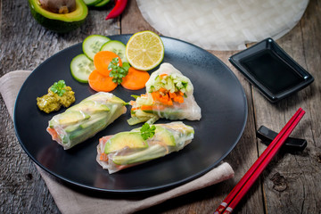 Spring rolls with vegetables and avocado