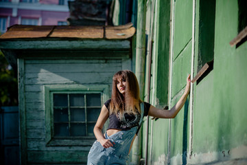 beautiful girl in denim overalls