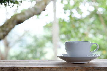 cup on the wood floor