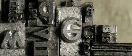 Metal Lettrpress Types.
A background from many historic typographical letters in black and white with white background. - obrazy, fototapety, plakaty