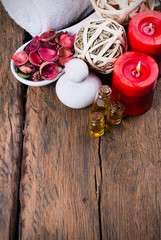 spa massage setting, nature product, oil on wooden background