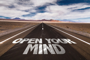 Open Your Mind written on desert road