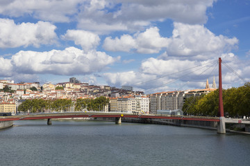Fototapeta premium View of Lyon with red footbridge