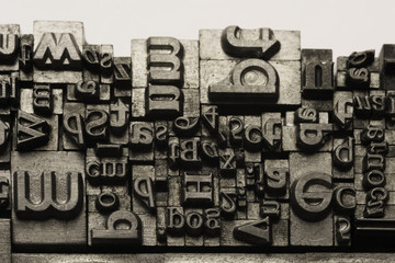 Metal Lettrpress Types.
A background from many historic typographical letters in black and white with white background.
 - obrazy, fototapety, plakaty