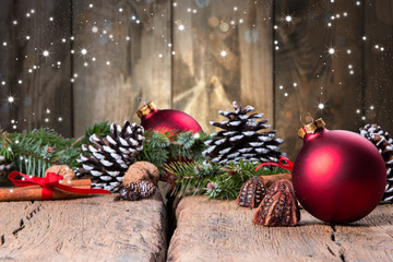 Christmas decoration, balls on dark wooden background 
