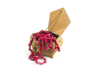 Wooden jewerly box with coral necklaces isolated on white