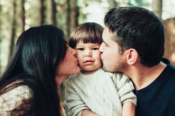 Fototapeta premium Mom Dad and son