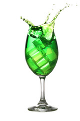 Green water spread in a wine glass isolated on white.