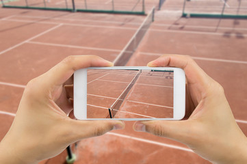 taking photo at the tennis court