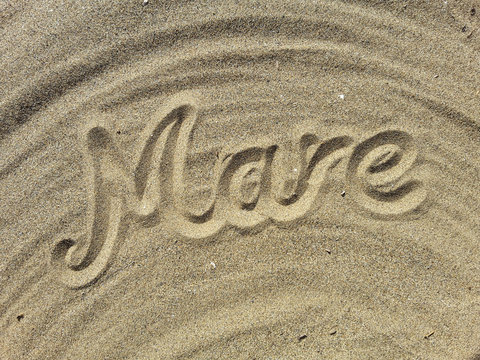 mare text design on the sand