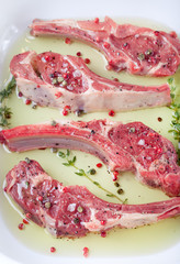 Obraz premium Raw meat, mutton, lamb rack with marinated 