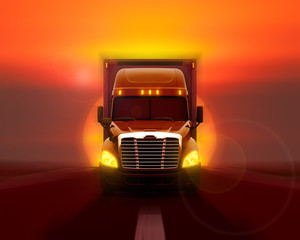 Freightliner cascadia truck moving fast on the road against the setting sun.