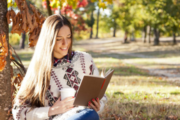 young girl in autumn outdoors