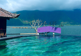 Fototapeta na wymiar Swimming pool with a view of the mountain