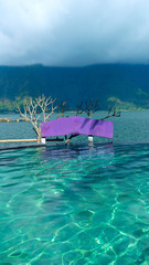 Fototapeta na wymiar Swimming pool with view of the mountain