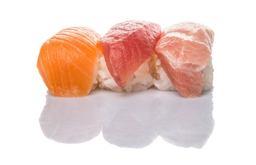 Japanese otoro sushi, red tuna sushi and salmon sushi over white background