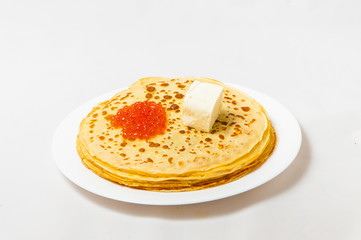 some pancakes on the white plate with red caviar