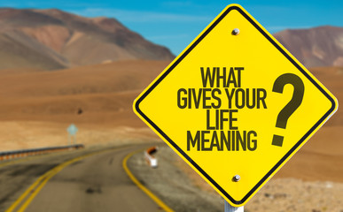 What Gives Your Life Meaning? sign on desert road