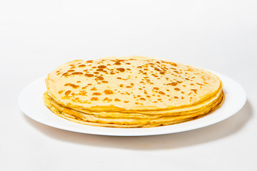 some pancakes on the white plate