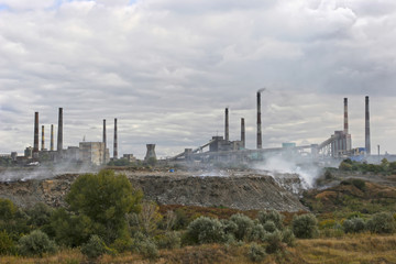 Large city garbage dump near the operating plants. Environmental