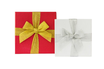 White and red  gift boxes with ribbon isolated over white
