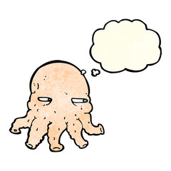 cartoon alien face with thought bubble